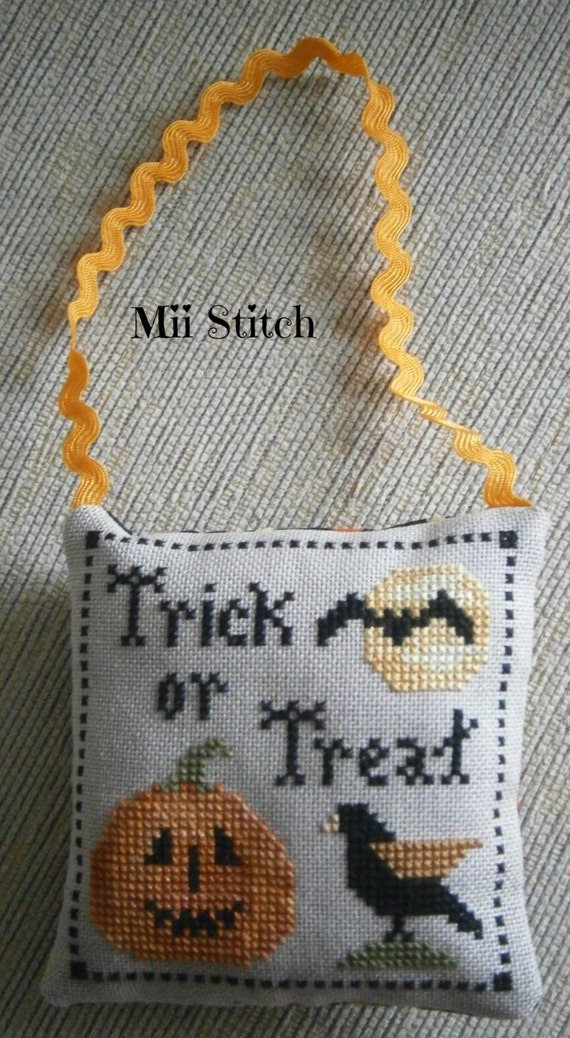 Finished cross stitch ornament Trick Or Treat from by MiiStitch