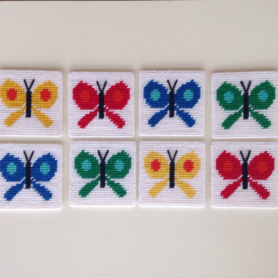 Vintage butterfly needlepoint coasters