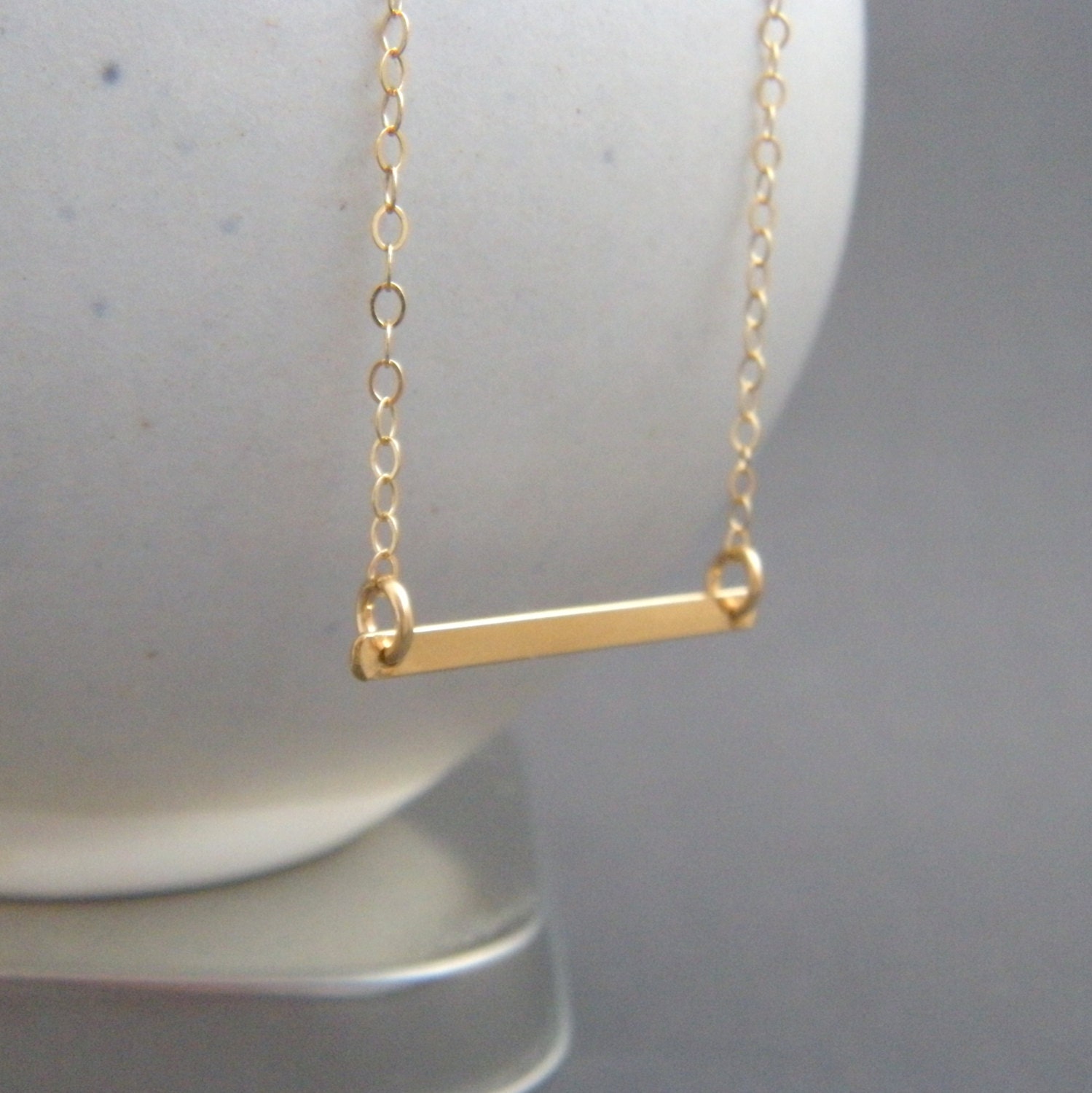 small gold bar necklace. petite flat bar. yellow 12K gold