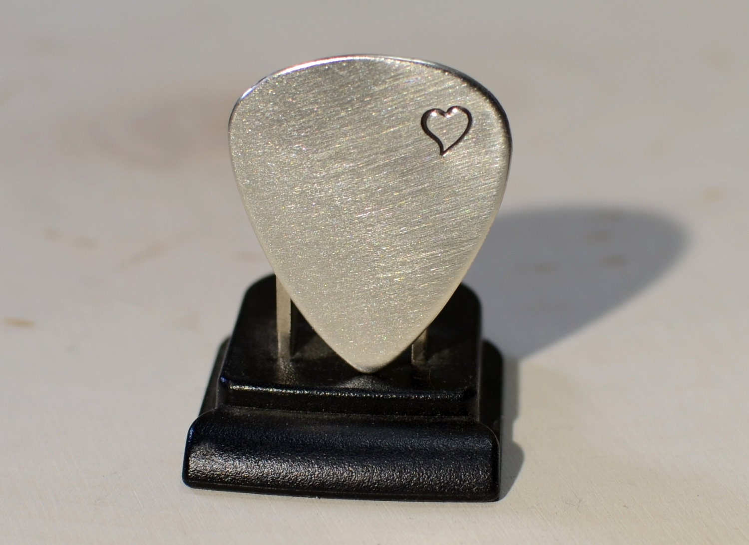 Sterling silver guitar pick brimming with love and a by NiciLaskin