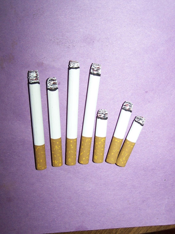 fake cigarettes/carvings/decoys/fake smokes/crafts/folk