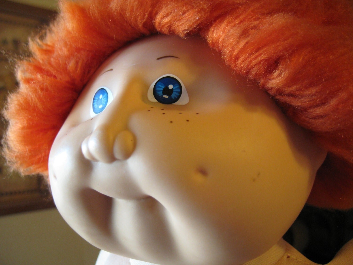 red fuzzy cabbage patch doll