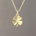 Tiny Gold Four Leaf Clover Necklace also in Silver