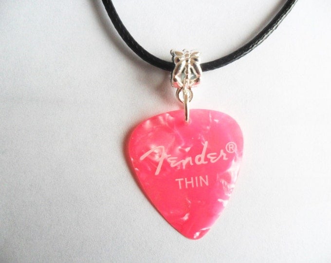 Pink Fender guitar pick necklace that is adjustable from 18" to 20"