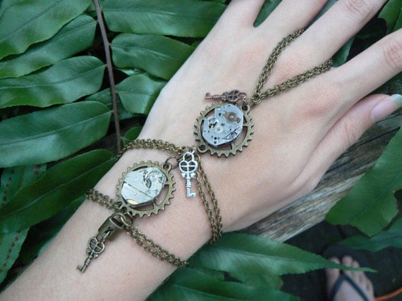 movements hand chain steampunk slave bracelet gears watch keys locks goth rocker bracelet unisex hipster victorian boho unisex style by gildedingypsy steampunk buy now online