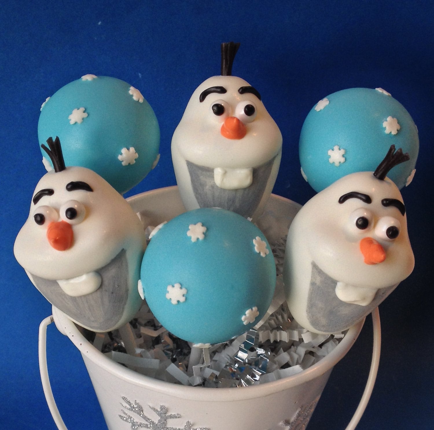 12 Snowman and Snowflake Cake Pops for snow party favors