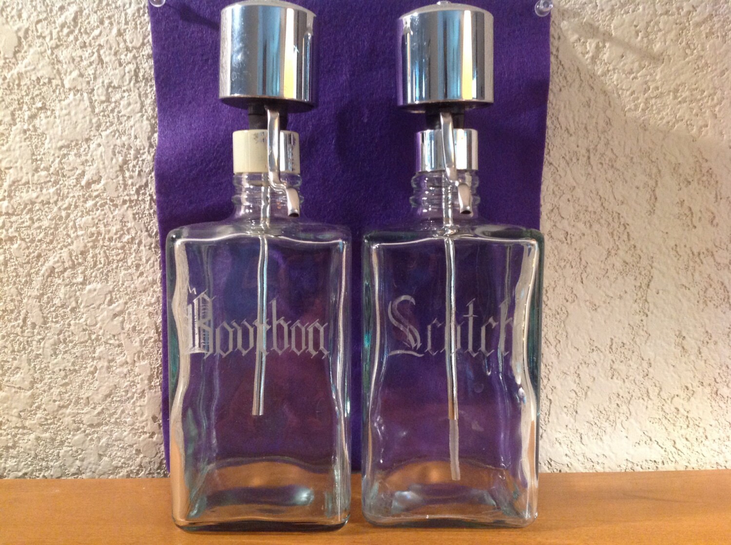 Set of Two Pump Liquor Decanters. Glass Etched With Bourbon