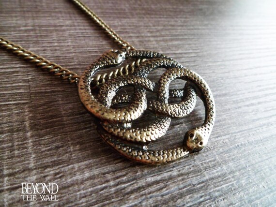 The neverending story auryn necklace