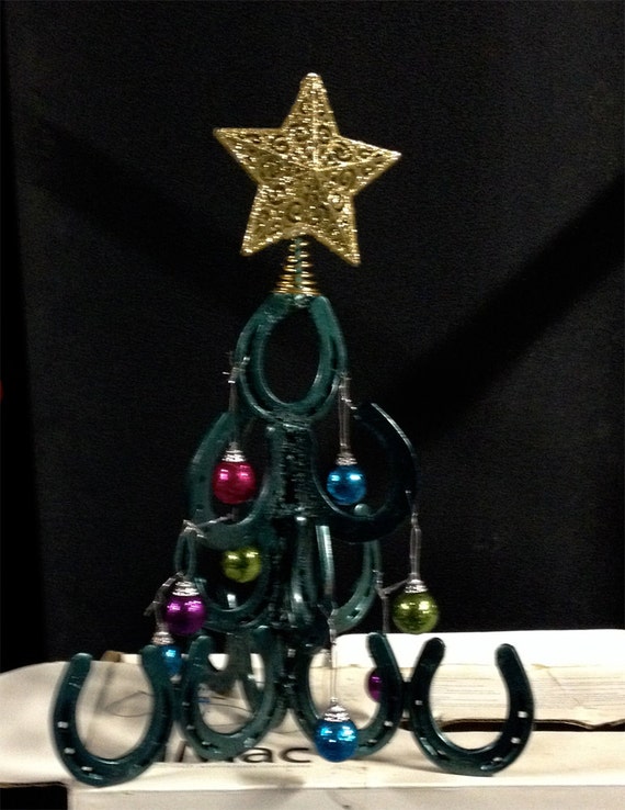 Christmas Tree made from horseshoes.