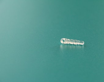 Cell Phone Dust Plug fits in headphone jack on cell phones and tablets - 1 piece in clear
