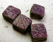 Spotted square metallic strata beads in polymer with plum, pale blue and pink accents