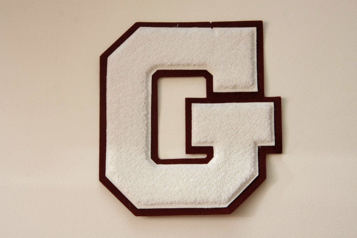 Varsity Letter G White with Marroon edges and backing