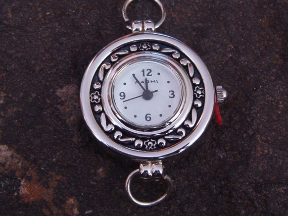 digital watch with changeable faces