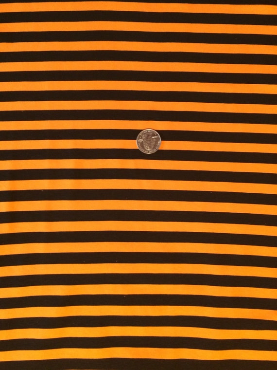 orange and black stripped shirt