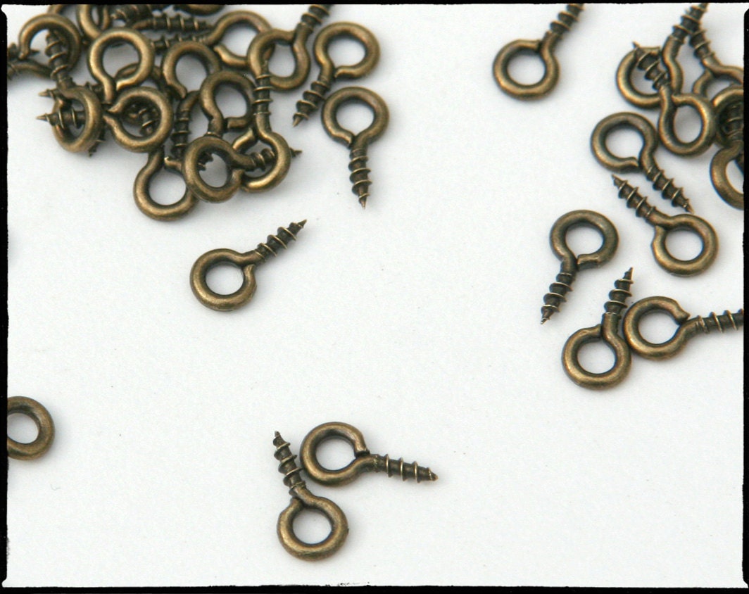 Screweyes. 100 Antiqued bronze color Screweye bails for