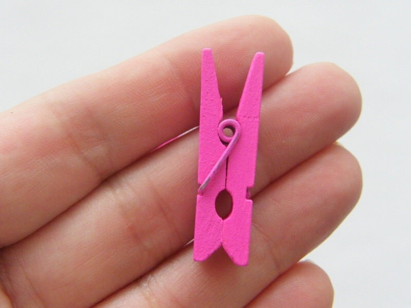 BULK 100 Hot pink wooden pegs 35 x 7mm