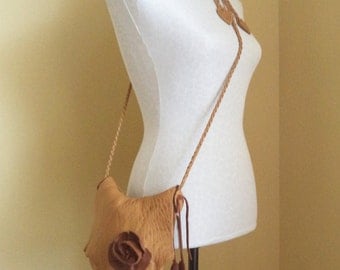 brown, camel leather handbag messenger with flower and 'leaf' fringe by Tuscada. Ready to ship.