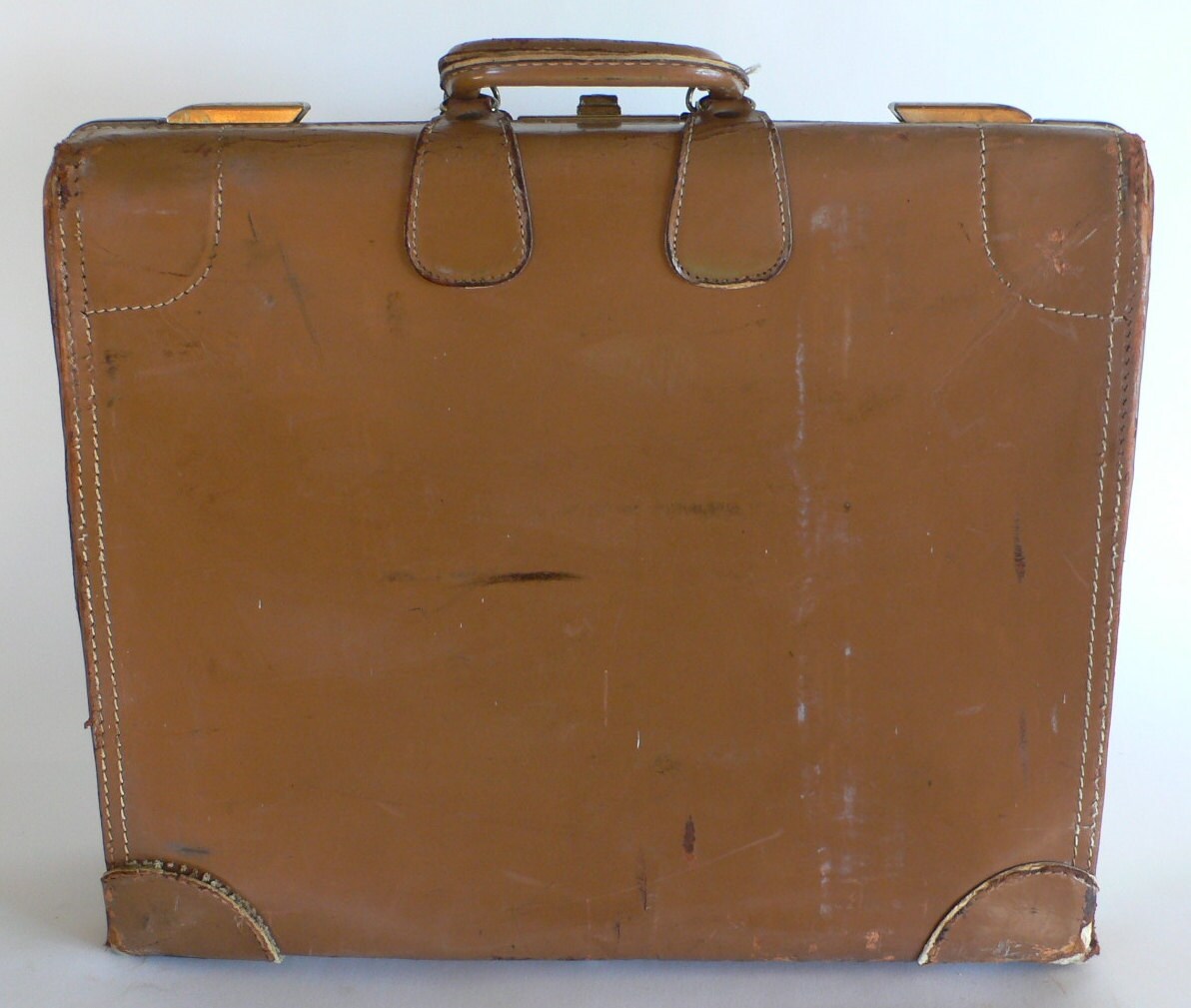 vintage leather suitcase battered and worn from by dizhasneatstuff
