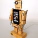 Robodock - iPhone 5 dock - robot in function of docking station (great geekery present) - unique design