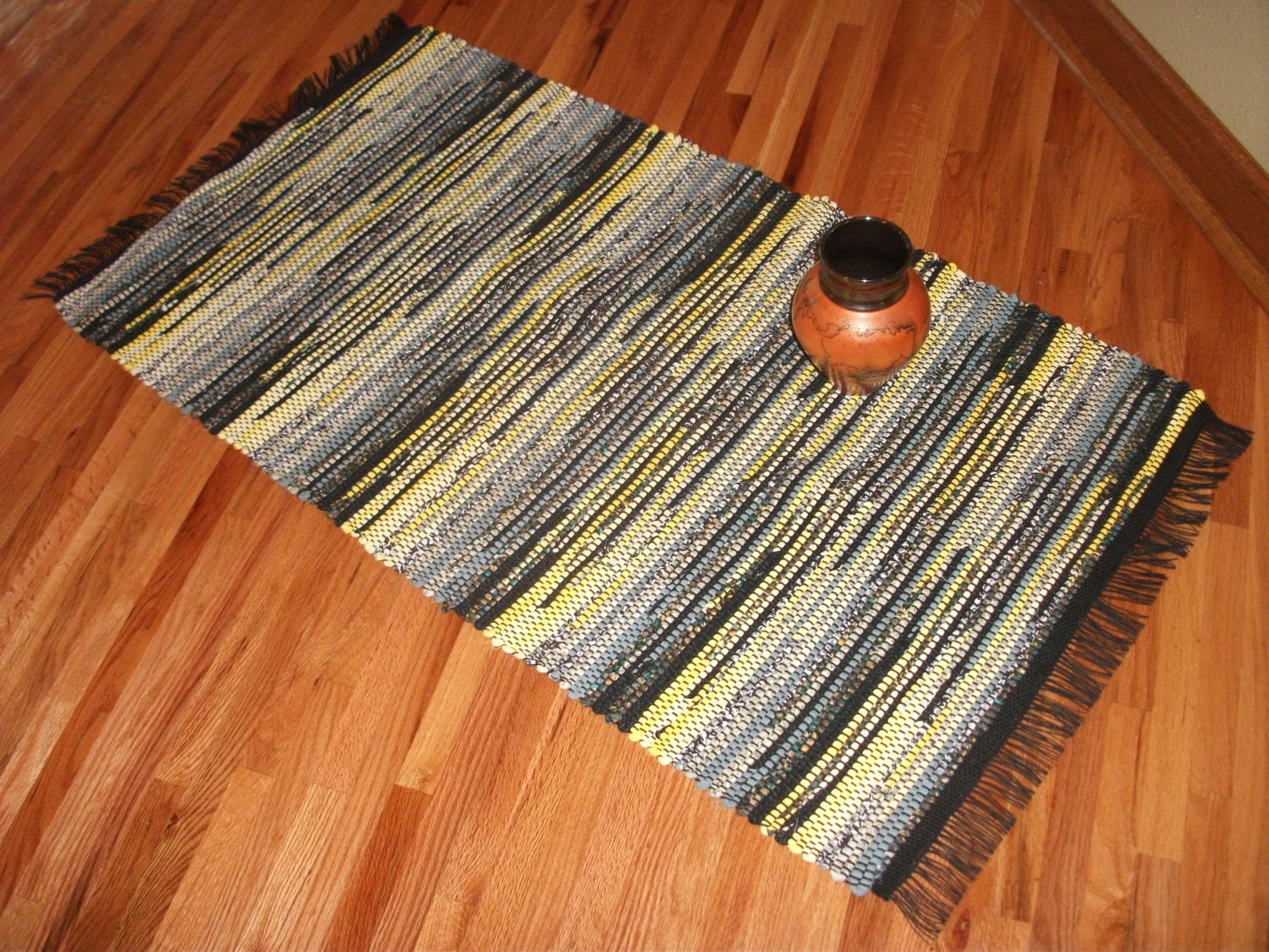 Handwoven rag rug made of recycled fabric and sheets in
