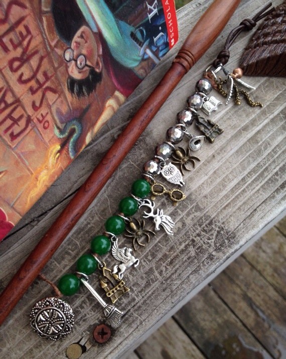 Items similar to HARRY POTTER inspired jewelry SLYTHERIN charmed