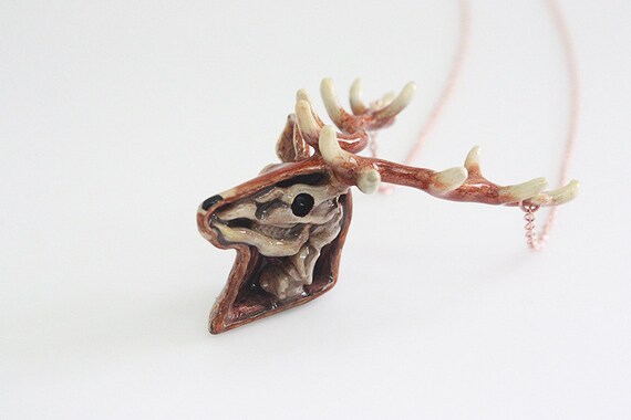 Items similar to Anatomy of A Deer Head Skeleton Pendant with Hand