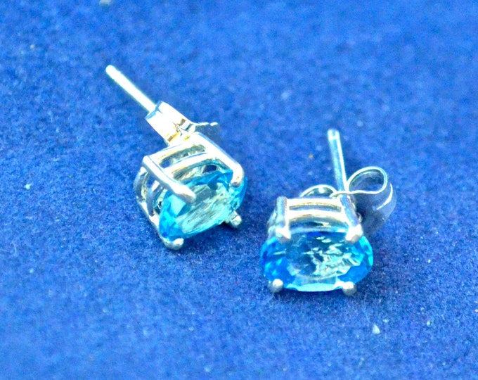 Swiss Blue Topaz Stud Earrings, 7x5mm Oval, Natural, Set in Sterling Silver E558