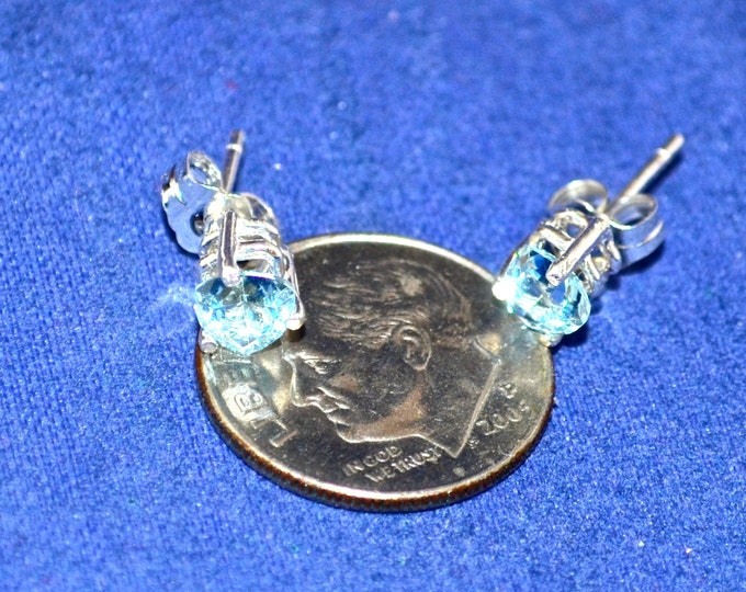 Sky Blue Topaz Studs, 5mm Trillion, Natural, Set in Sterling Silver E619