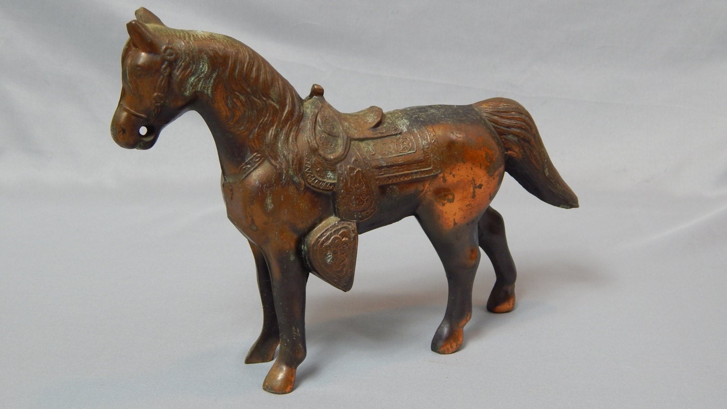 old metal horse figurines