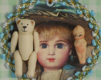 porcelain doll with teddy bear