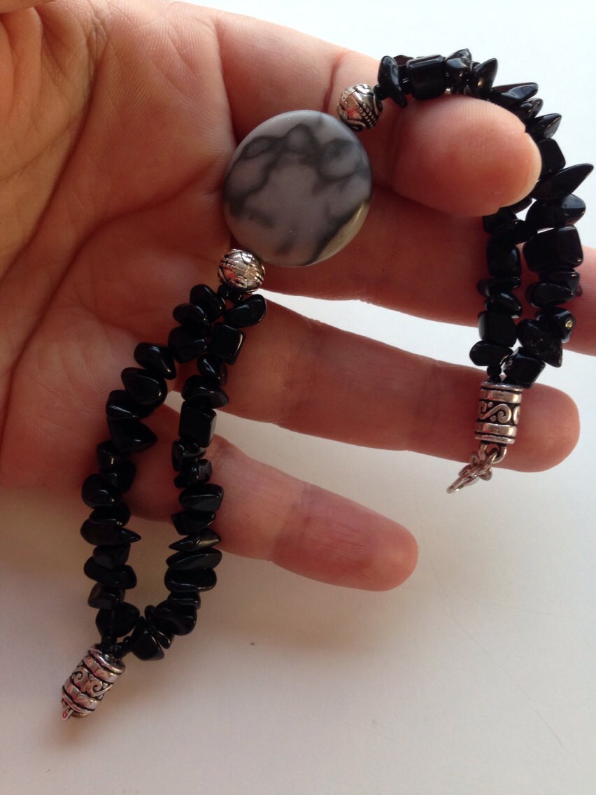 Calming and grounding bracelet in black by GinasCreativeDesigns