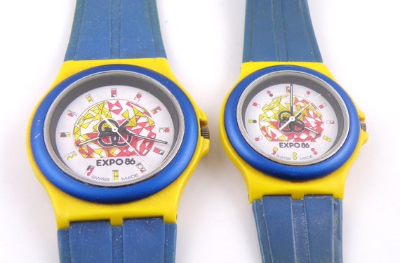 Pair of Expo 86 Swatch Watches. Man's and Woman's