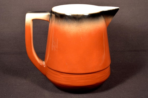 https://www.etsy.com/listing/184056251/pitcher-southwest-design-ceramic-esmond?ga_order=most_relevant&ga_search_type=all&ga_view_type=gallery&ga_search_query=v2%20v2team%20black%20barware&ref=sr_gallery_14