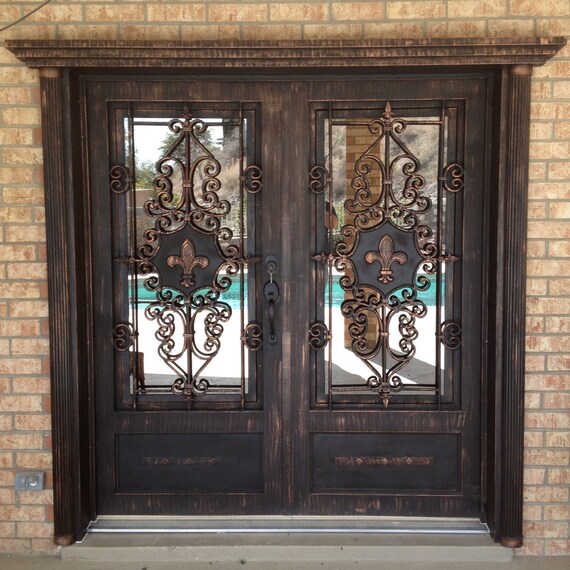 Items similar to Iron Door, Hand Custom made. Antique bronze