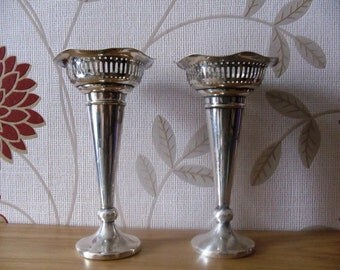 2 vintage silver plated candlesticks.