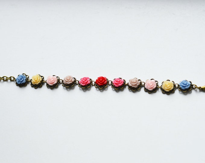 FLORAL MOTIFS The bracelet metal brass with roses of polymer clay