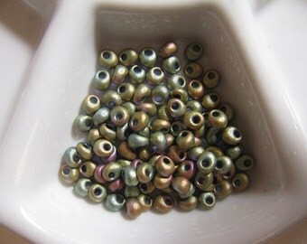 TOHO (color F463K) 3mm Magatamas Matte Metallic Khaki Iris - appproximately 15 Grams