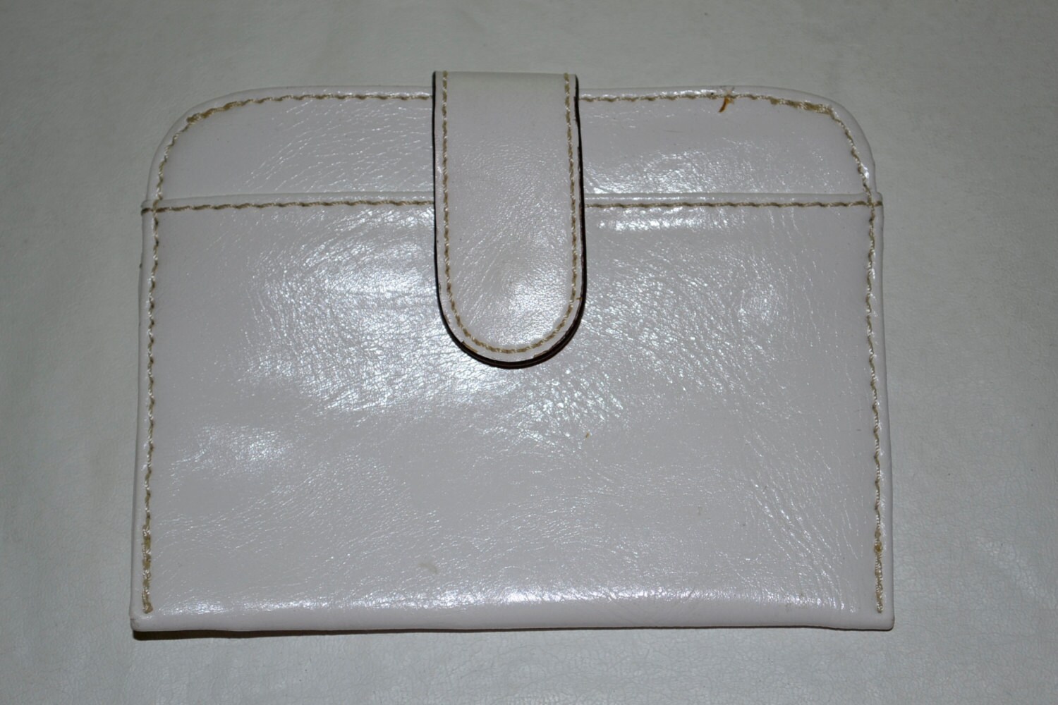 white purse wallet