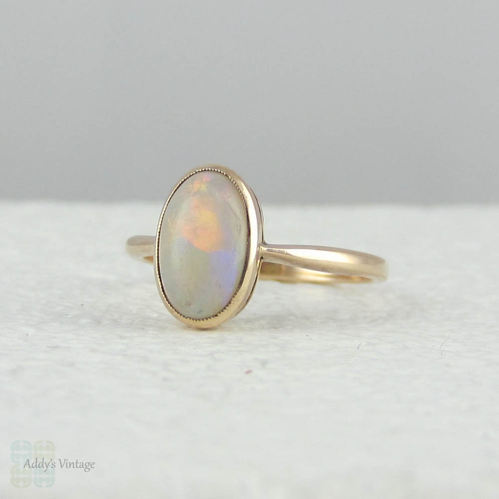 Antique Opal Ring in Rose Gold. Bezel Set Oval Opal Circa