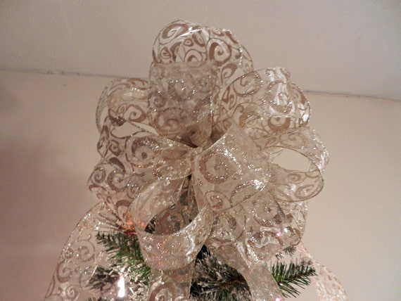 large christmas tree topper bow made with a sheer ribbon with large christmas tree topper bow made with a sheer ribbon with
