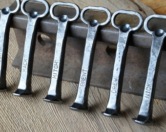 Personalized Bottle Opener made from reclaimed railway spike.