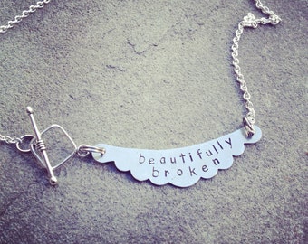 hand stamped banner NAME necklace
