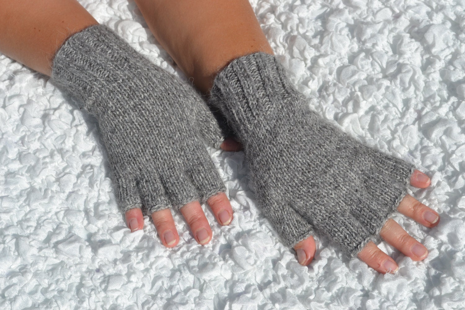Handknitted grey half finger gloves
