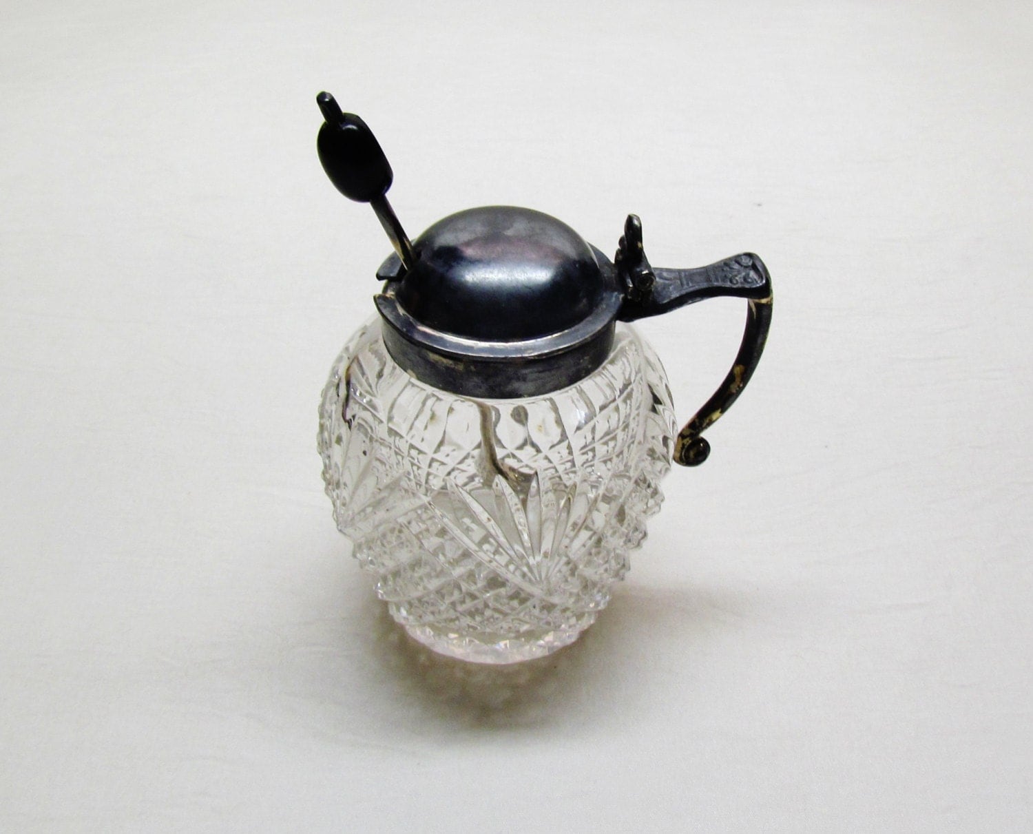 Antique cut glass mustard pot with spoon, early 1900’s diamond and fan
