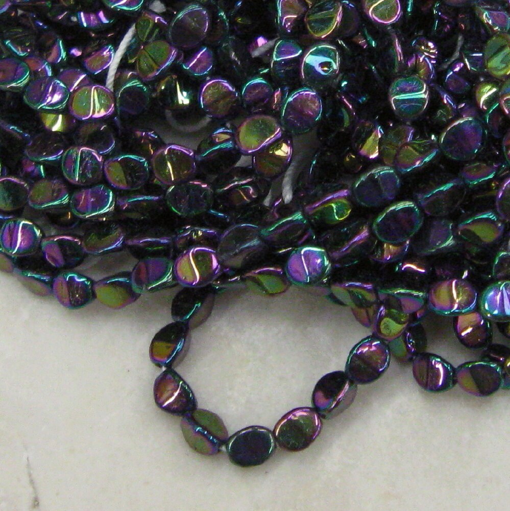 Vintage Iridescent 5x4mm 3 Sided Glass Beads in Purple Iris.