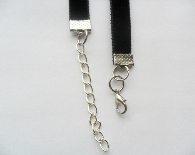 Saturn black velvet choker necklace with a width of 3/8”inch.