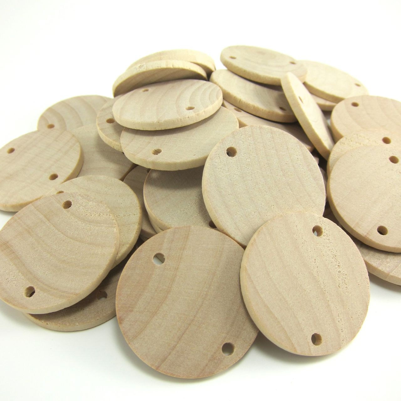 Wooden discs with holes