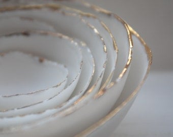 Set of 7 stoneware fine bone china nesting bowls with real gold.