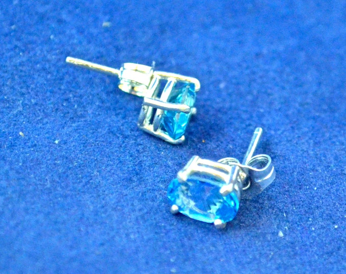 Swiss Blue Topaz Stud Earrings, 7x5mm Oval, Natural, Set in Sterling Silver E558