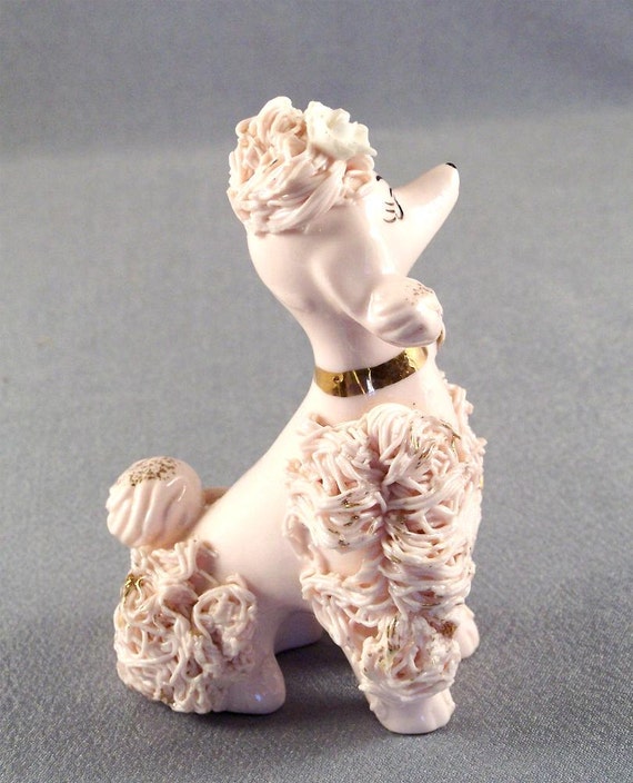 pink spaghetti poodle figurine